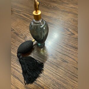 Elegant Black and Gold Perfume Bottle